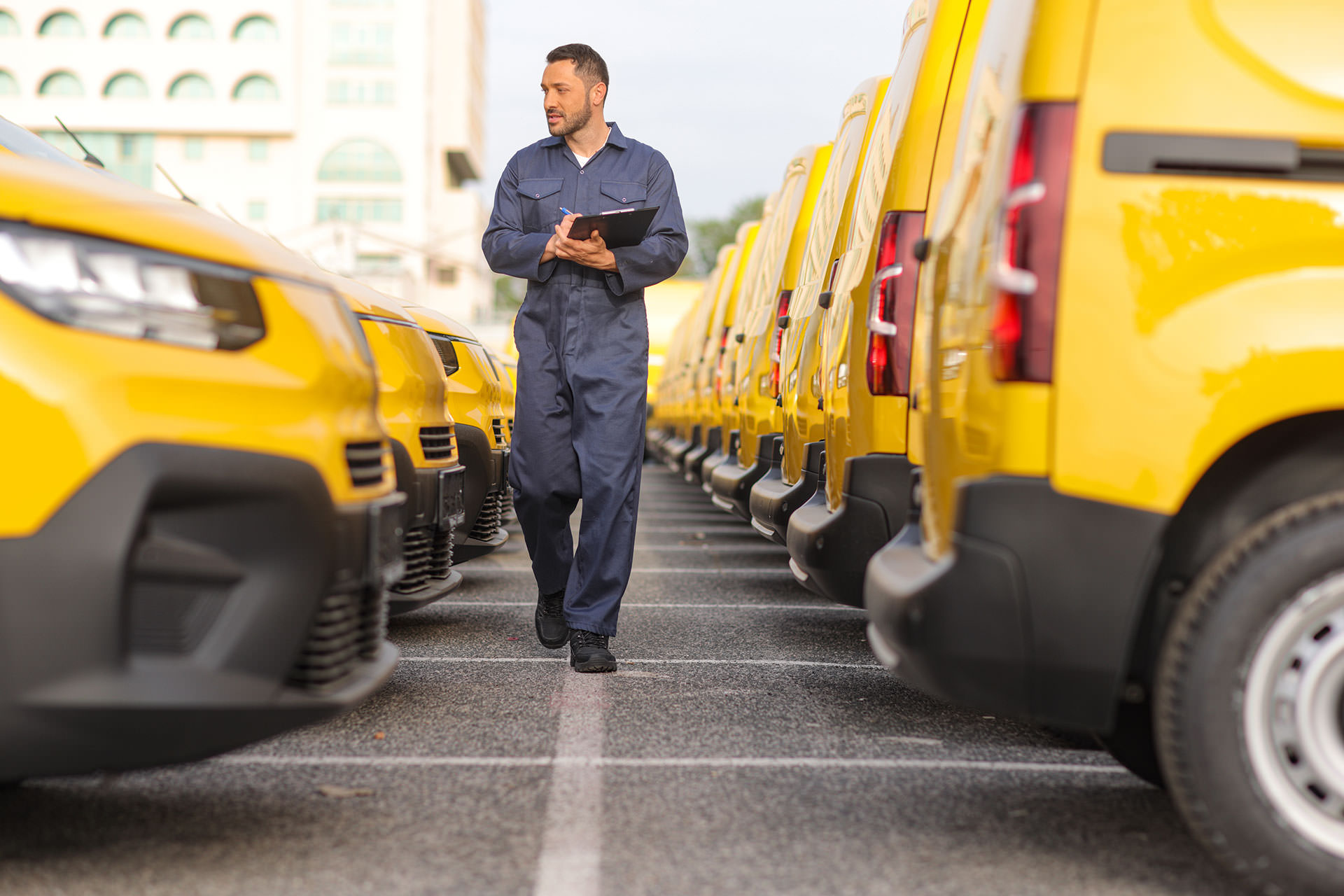 Fleet manager reviewing a commercial vehicle fleet to help prevent registration lapses and maintain Oklahoma fleet compliance.